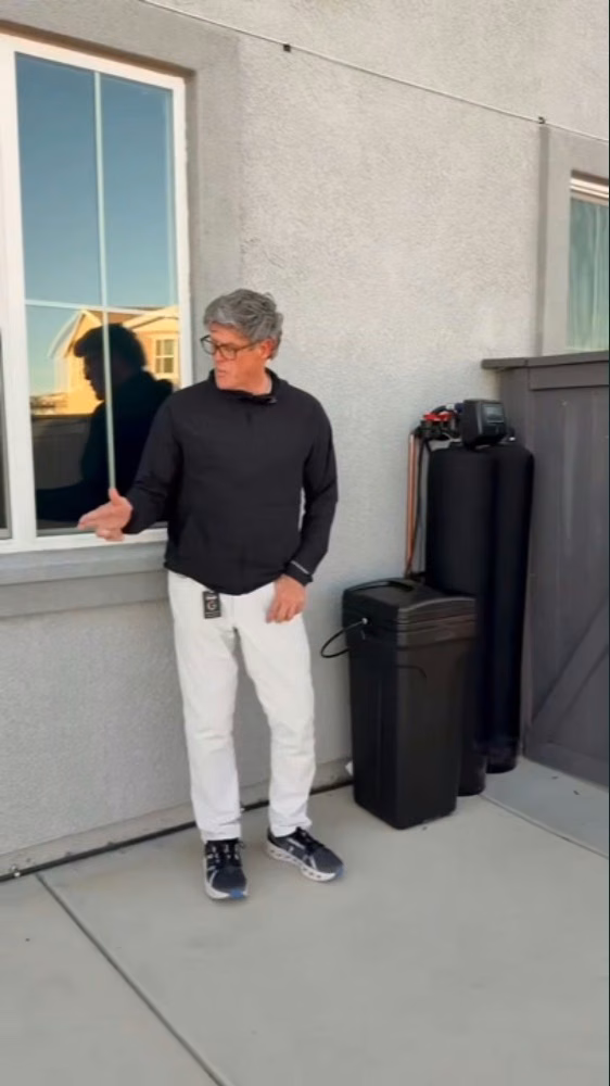 Chris beside completed whole-home equipment at a Folsom installation