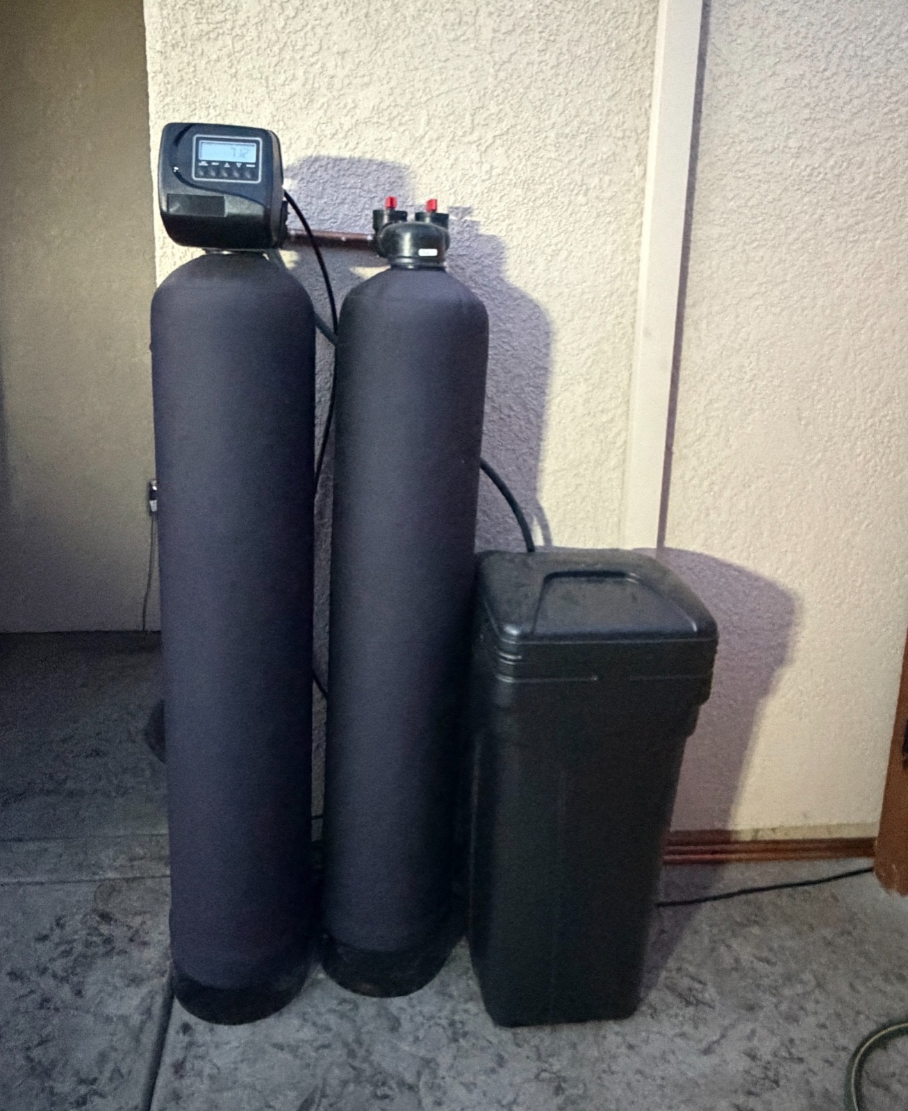 Dual-tank whole-home filtration and softening equipment installed at a Rancho Cordova home.